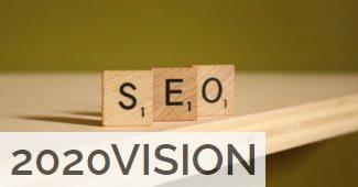 a wooden block that says seo on it