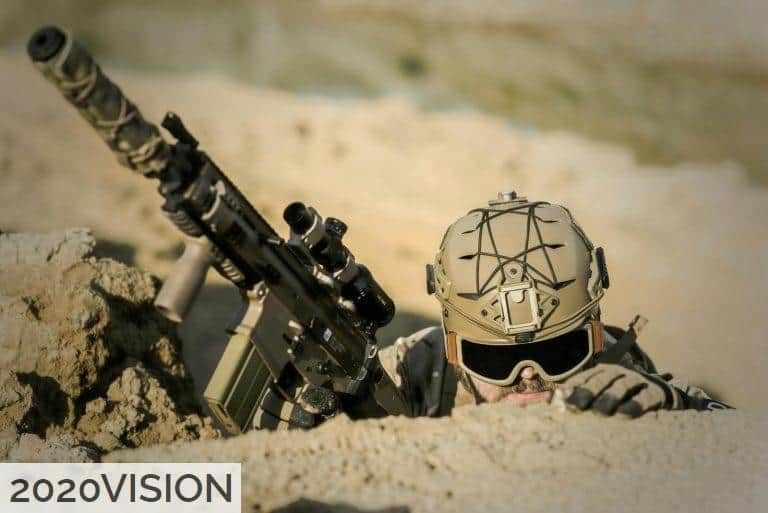 Soldier Wearing Brown Helmet Holding Assault Rifle during Daytime