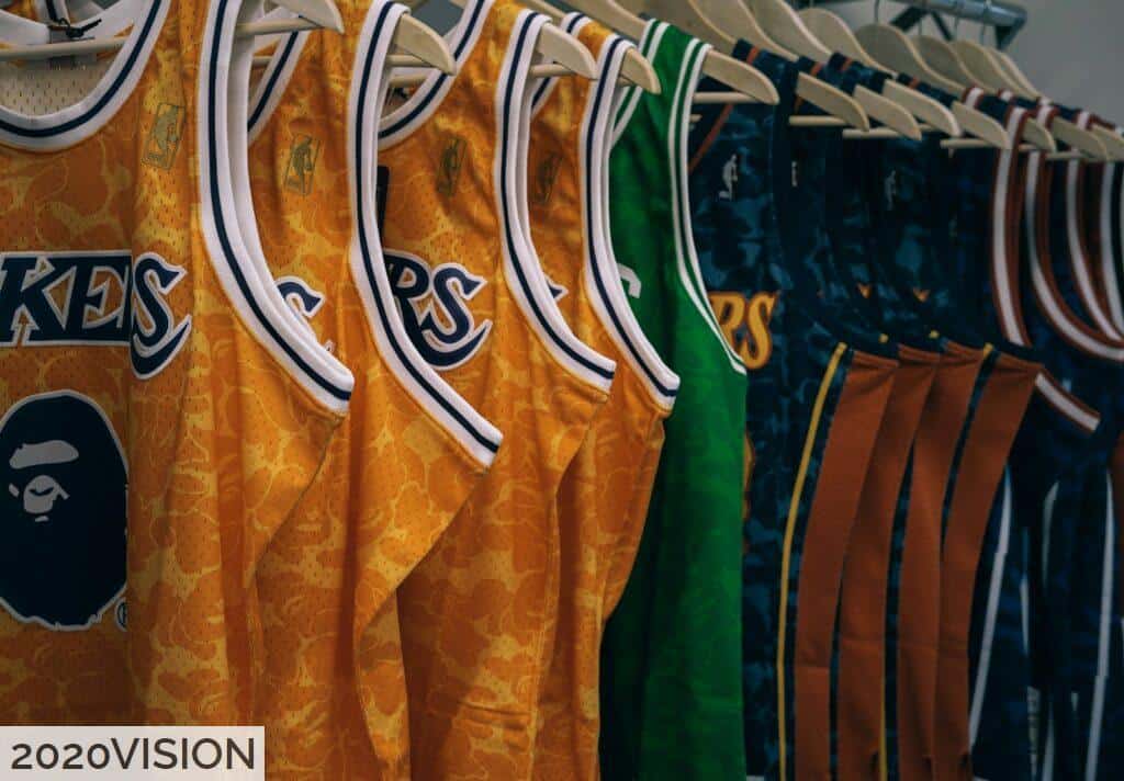 assorted NBA jerseys hanged on clothes hangers