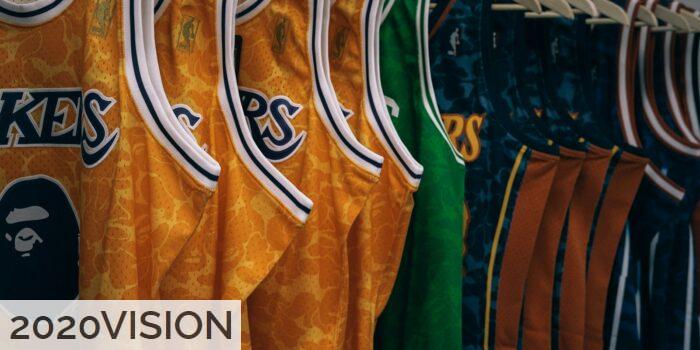 assorted NBA jerseys hanged on clothes hangers